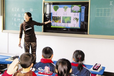 原平市第一小學通過交互式多媒體教學方法上課(圖)